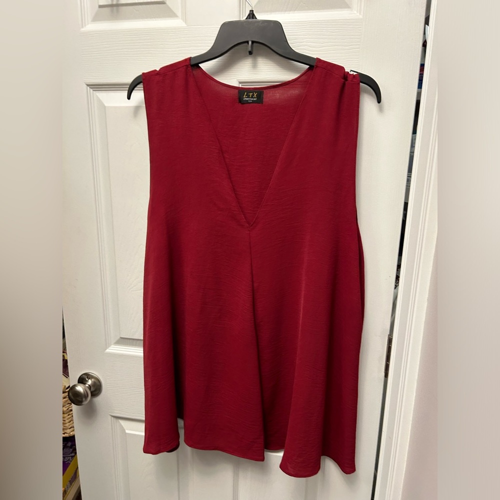 Red v neck shirt sleeveless